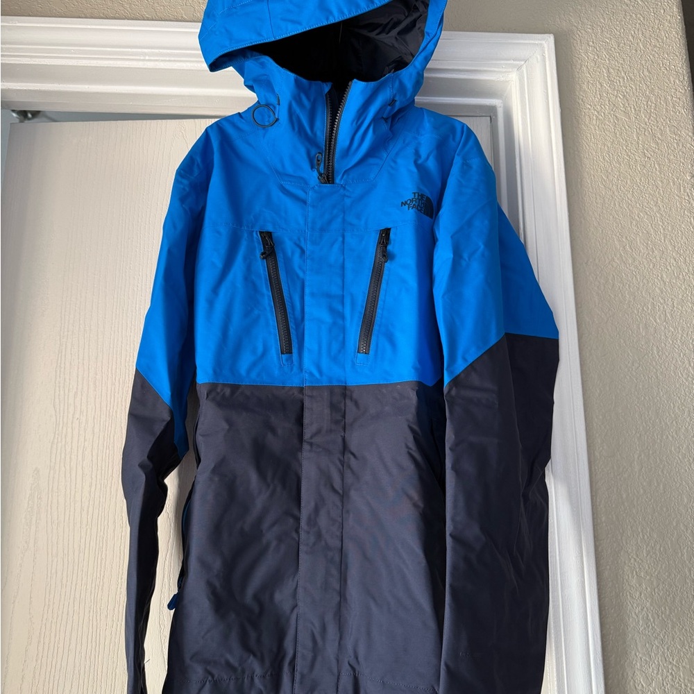 The North Face Blue and Black Raincoat with Hooded Design